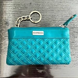 Express zippered teal wallet with key holder/key ring.  Offers welcome
